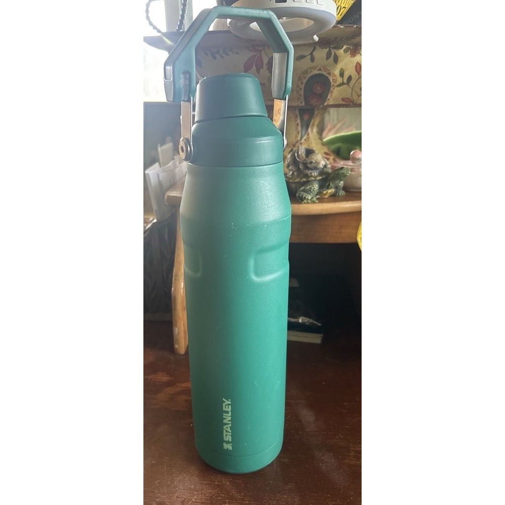 Stanley Aerolight IceFlow Water Bottle with A Fast Flow Lid. 36 Oz Green Handle